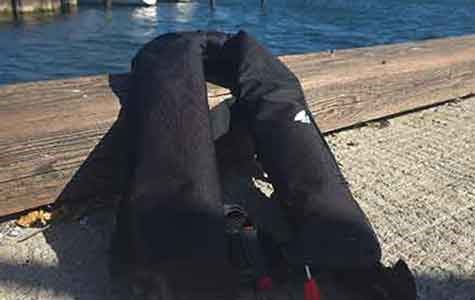 An inflatable life jacket is packed on the boat bridge.